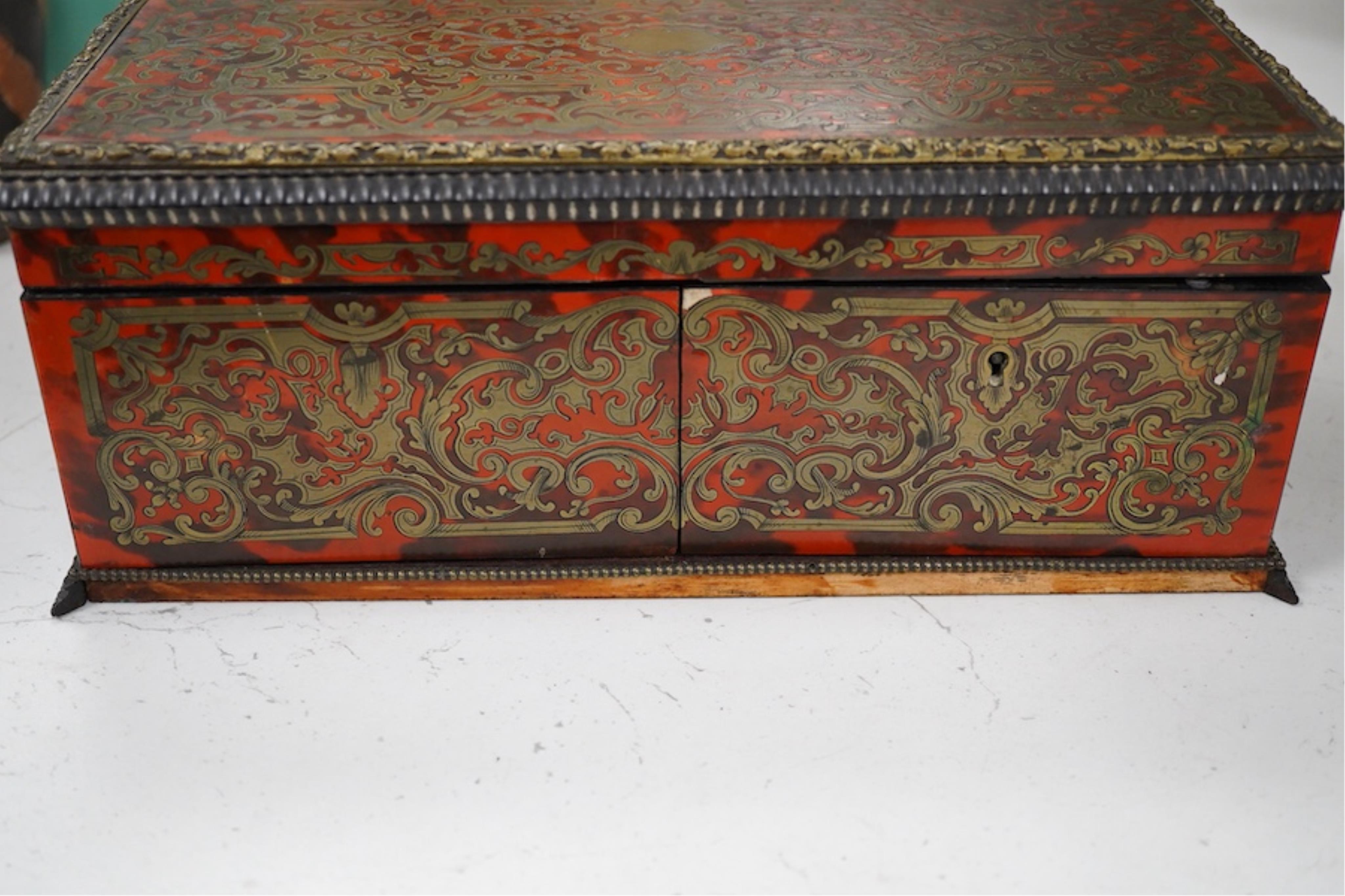 A 19th century French boullework glove box, signed Tahan, Rue de la Paix, width 27cm.